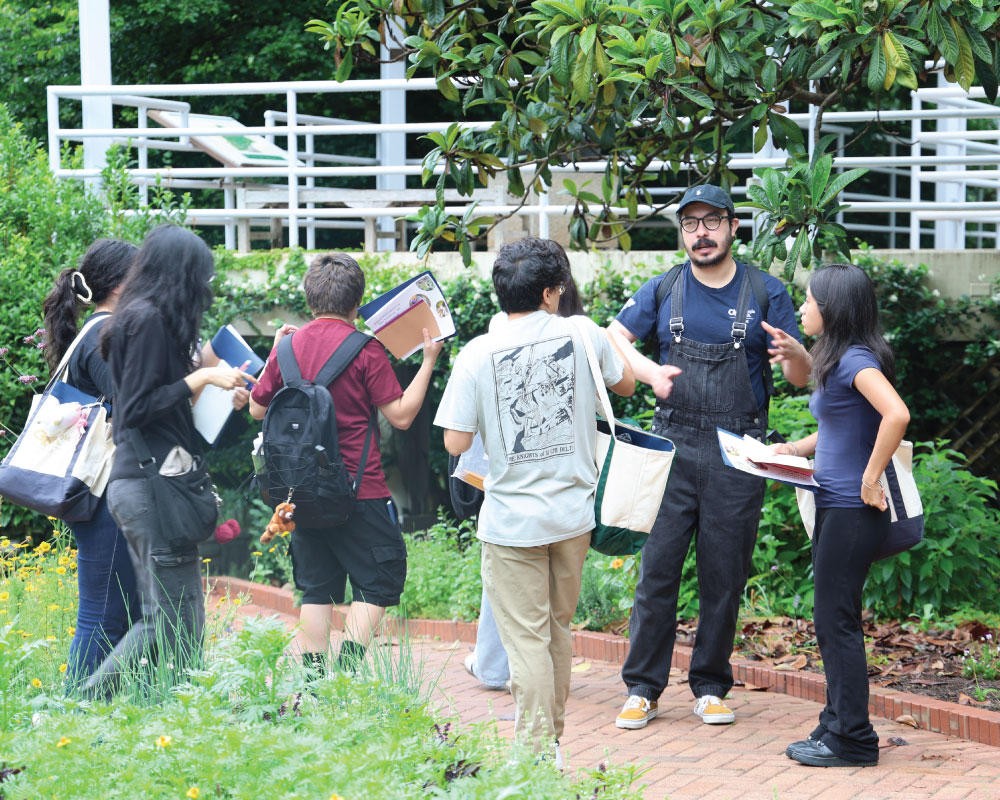 an instructor and a group of students outdoors